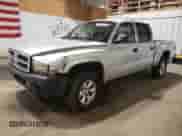 2003 Dodge Dakota Sport with VIN 1D7HG38X83S300059, listed as a Copart auction lot 61420305 with 230,971 mi miles and Salvage title. Bid and sale history available at DreamBid. Image 1.