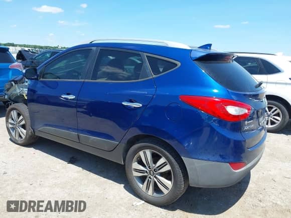2014 Hyundai Tucson Limited z VIN KM8JU3AG8EU819923, wystawiony jako IAAI lot #42389392 z przebiegiem 111 009 mil mil oraz . Historia ofert i sprzedaży dostępna na DreamBid. Obrazek 3.