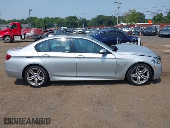 2016 BMW 5 Series 535i xDrive z VIN WBA5B3C54GD549077, wystawiony jako IAAI lot #42902821 z przebiegiem 163 424 mil mil oraz . Historia ofert i sprzedaży dostępna na DreamBid. Obrazek 13.