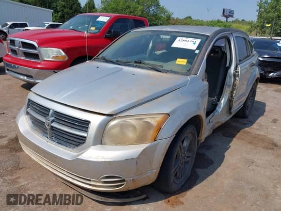 2007 Dodge Caliber SXT with VIN 1B3HB48B67D114910, listed as a IAAI auction lot 42881361 with Not provided miles and . Bid and sale history available at DreamBid. Image 2.