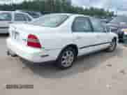 1995 Honda Accord with VIN 1HGCE6641SA013740, listed as a IAAI auction lot 42494293 with 173,961 mi miles and . Bid and sale history available at DreamBid. Image 4.