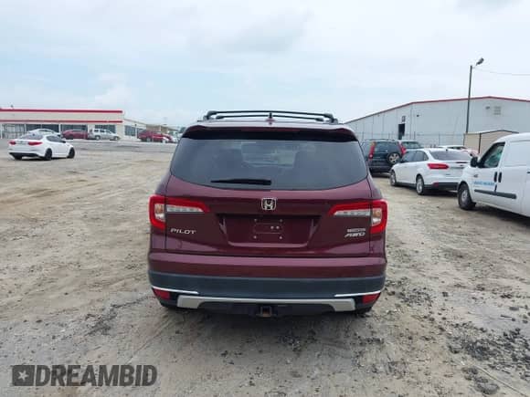 2021 Honda Pilot Touring 7-Passenger z VIN 5FNYF6H66MB062166, wystawiony jako IAAI lot #42550464 z przebiegiem 52 376 mil mil oraz . Historia ofert i sprzedaży dostępna na DreamBid. Obrazek 16.
