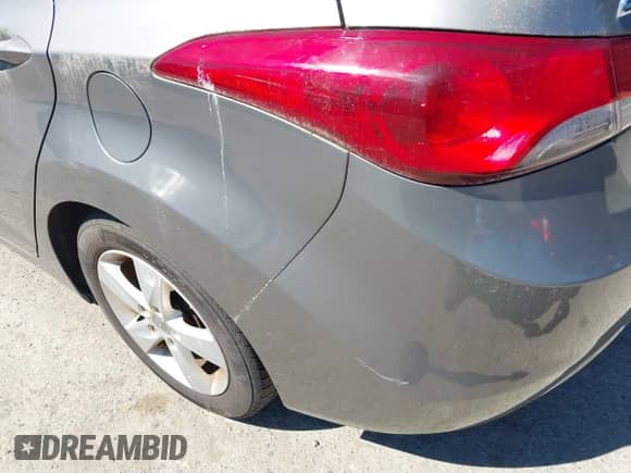 2013 Hyundai Elantra GLS with VIN 5NPDH4AE2DH354719, listed as a IAAI auction lot 42976433 with 96,234 mi miles and . Bid and sale history available at DreamBid. Image 6.