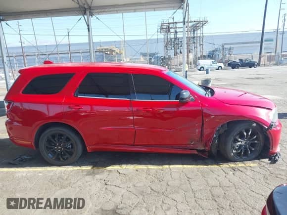 2019 Dodge Durango GT Plus with VIN 1C4RDJDG3KC525483, listed as a IAAI auction lot 42827208 with 106,587 mi miles and . Bid and sale history available at DreamBid. Image 14.