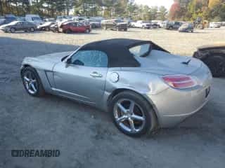 2007 Saturn Sky with VIN 1G8MB35B57Y124617, listed as a Copart auction lot 76162604 with 140,003 mi miles and Salvage title. Bid and sale history available at DreamBid. Image 2.