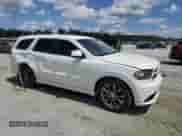 2014 Dodge Durango SXT with VIN 1C4RDHAG3EC974194, listed as a Copart auction lot 70314445 with 131,097 mi miles and Salvage title. Bid and sale history available at DreamBid. Image 4.