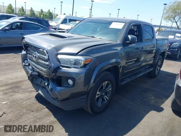 2016 Toyota Tacoma SR5 with VIN 3TMAZ5CNXGM009360, listed as a IAAI auction lot 43186084 with 89,490 mi miles and . Bid and sale history available at DreamBid. Image 2.