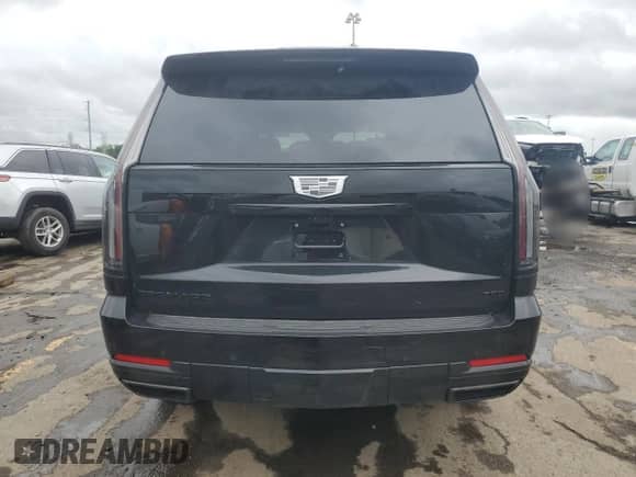 2025 Cadillac Escalade with VIN 1GYS9ERL5SR126002, listed as a Copart auction lot 61239315 with 3,693 mi miles and Salvage title. Bid and sale history available at DreamBid. Image 6.