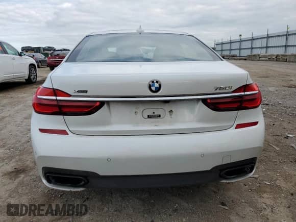 2019 BMW 7 Series 750i xDrive with VIN WBA7F2C58KB239848, listed as a Copart auction lot 73400304 with Not provided miles and Salvage title. Bid and sale history available at DreamBid. Image 6.