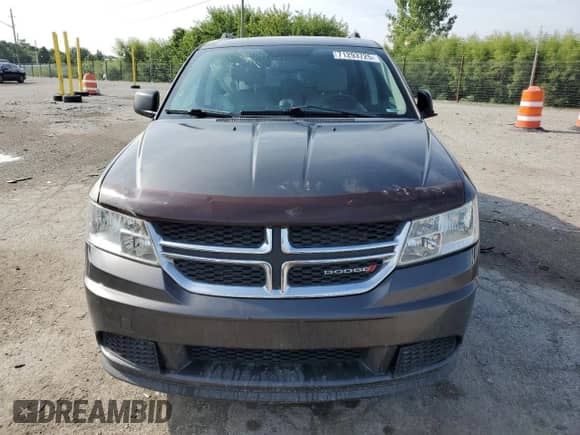 2015 Dodge Journey SE с VIN 3C4PDCABXFT735925, выставлен на аукционе Copart как лот 71293725 с пробегом 112 652 миль миль и Списание • Salvage title. История ставок и продаж доступна на DreamBid. Изображение 5.