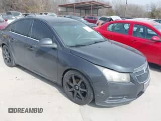 2014 Chevrolet Cruze 1LT with VIN 1G1PD5SB9E7209646, listed as a IAAI auction lot 41594757 with 184,464 mi miles and . Bid and sale history available at DreamBid. Image 1.