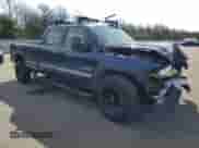 2002 Chevrolet Silverado 2500HD LS z VIN 1GCHK23132F204840, wystawiony jako Copart lot #71725464 z przebiegiem Nie podano mil oraz Szkoda całkowita • Salvage title. Historia ofert i sprzedaży dostępna na DreamBid. Obrazek 4.