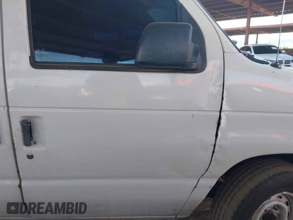 1999 Ford Econoline Cargo with VIN 1FTRE14W8XHA92984, listed as a IAAI auction lot 43317343 with 351,272 mi miles and . Bid and sale history available at DreamBid. Image 12.