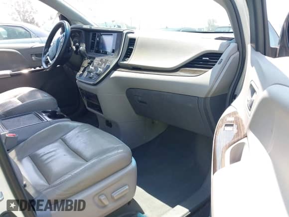 2015 Toyota Sienna XLE with VIN 5TDYK3DC8FS639719, listed as a IAAI auction lot 42753578 with 157,983 mi miles and . Bid and sale history available at DreamBid. Image 5.