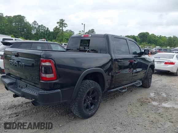 2020 Ram 1500 Rebel z VIN 1C6SRFLT7LN196248, wystawiony jako IAAI lot #42221745 z przebiegiem 40 860 mil mil oraz . Historia ofert i sprzedaży dostępna na DreamBid. Obrazek 4.