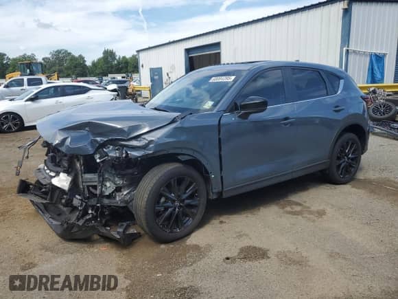 2022 Mazda CX-5 S Preferred z VIN JM3KFBCM1N0631579, wystawiony jako Copart lot #68084395 z przebiegiem Nie podano mil oraz Szkoda całkowita • Salvage title. Historia ofert i sprzedaży dostępna na DreamBid. Obrazek 1.