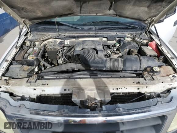 2003 Ford F-150 XL z VIN 2FTRF18W53CA04398, wystawiony jako Copart lot #42981485 z przebiegiem 244 706 mil mil oraz Szkoda całkowita • Salvage title. Historia ofert i sprzedaży dostępna na DreamBid. Obrazek 11.