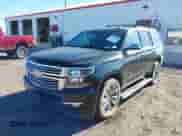 2016 Chevrolet Tahoe LTZ with VIN 1GNSKCKC7GR356857, listed as a IAAI auction lot 43515148 with 159,145 mi miles and . Bid and sale history available at DreamBid. Image 2.