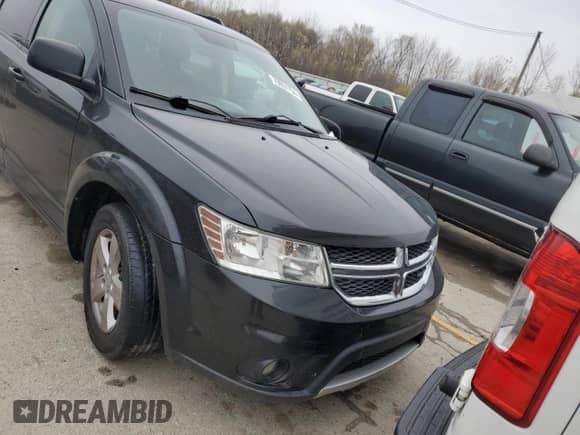2012 Dodge Journey SXT z VIN 3C4PDDBG0CT191236, wystawiony jako Copart lot #79651754 z przebiegiem 129 579 mil mil oraz Szkoda całkowita • Salvage title. Historia ofert i sprzedaży dostępna na DreamBid. Obrazek 5.