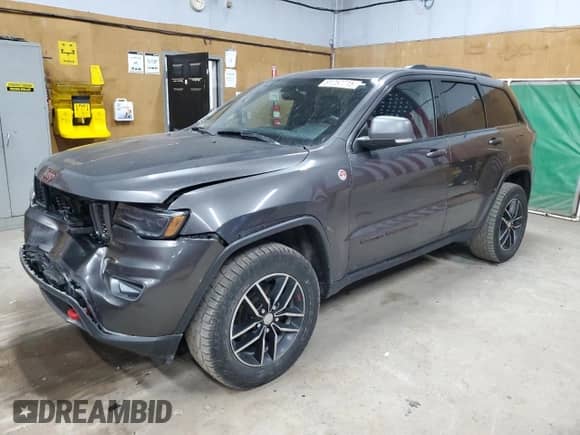 2017 Jeep Grand Cherokee Trailhawk z VIN 1C4RJFLG1HC889451, wystawiony jako Copart lot #81257715 z przebiegiem 138 791 mil mil oraz Czysty tytuł • Clean title. Historia ofert i sprzedaży dostępna na DreamBid. Obrazek 1.