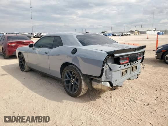 2020 Dodge Challenger SXT with VIN 2C3CDZAG3LH218990, listed as a Copart auction lot 81957265 with 59,129 mi miles and Salvage title. Bid and sale history available at DreamBid. Image 2.