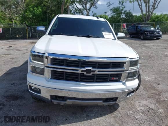 2014 Chevrolet Silverado 1500 LT with VIN 3GCUKREC4EG165040, listed as a IAAI auction lot 42496096 with 145,527 mi miles and . Bid and sale history available at DreamBid. Image 13.