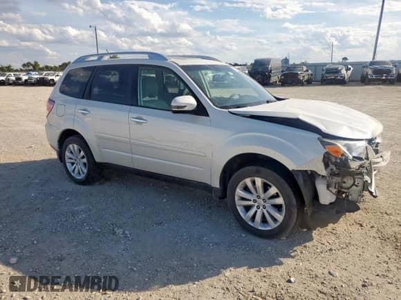 2013 Subaru Forester X Touring z VIN JF2SHAHC2DH412029, wystawiony jako Copart lot #82295635 z przebiegiem 88 432 mil mil oraz Szkoda całkowita • Salvage title. Historia ofert i sprzedaży dostępna na DreamBid. Obrazek 4.