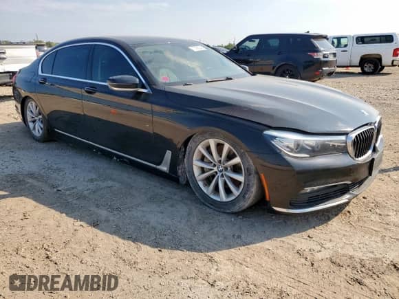 2018 BMW 7 Series 740i with VIN WBA7E2C5XJG741491, listed as a Copart auction lot 70065045 with 119,135 mi miles and Clean title. Bid and sale history available at DreamBid. Image 4.
