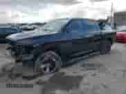 2019 Ram 1500 SLT with VIN 3C6RR7LTXKG723064, listed as a Copart auction lot 87424184 with 101,979 mi miles and Salvage title. Bid and sale history available at DreamBid. Image 1.