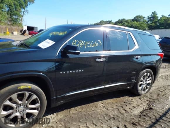 2018 Chevrolet Traverse Premier with VIN 1GNEVJKW7JJ156392, listed as a IAAI auction lot 42845663 with 176,184 mi miles and . Bid and sale history available at DreamBid. Image 14.