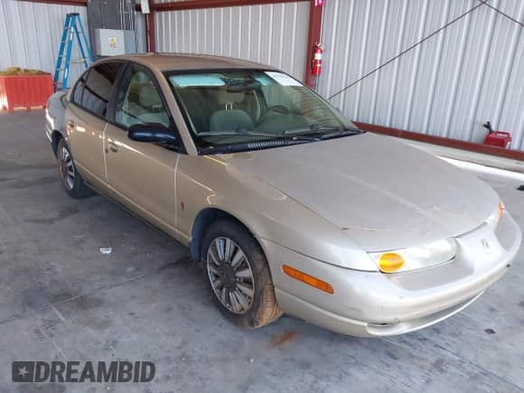 2001 Saturn SL with VIN 1G8ZJ52751Z323530, listed as a IAAI auction lot 43270139 with 111,982 mi miles and . Bid and sale history available at DreamBid. Image 1.