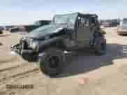 2005 Jeep Wrangler SE z VIN 1J4FA29175P331391, wystawiony jako Copart lot #76608824 z przebiegiem 98 268 mil mil oraz Szkoda całkowita • Salvage title. Historia ofert i sprzedaży dostępna na DreamBid. Obrazek 1.
