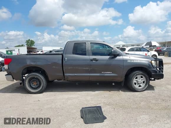 2012 Toyota Tundra с VIN 5TFUM5F18CX029289, выставлен на аукционе IAAI как лот 42583440 с пробегом Не указан миль и . История ставок и продаж доступна на DreamBid. Изображение 13.