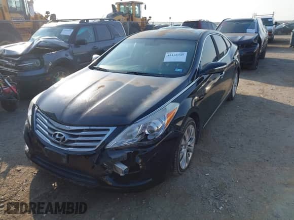 2014 Hyundai Azera Limited with VIN KMHFH4JG7EA396981, listed as a IAAI auction lot 43135345 with 94,613 mi miles and . Bid and sale history available at DreamBid. Image 2.