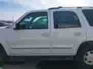 2002 Chevrolet Tahoe Z71 z VIN 1GNEK13Z42R256342, wystawiony jako IAAI lot #41838869 z przebiegiem 230 351 mil mil oraz . Historia ofert i sprzedaży dostępna na DreamBid. Obrazek 14.