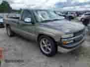 1999 Chevrolet Silverado 1500 with VIN 1GCEC14V0XE137610, listed as a Copart auction lot 65806015 with 103,303 mi miles and Salvage title. Bid and sale history available at DreamBid. Image 4.