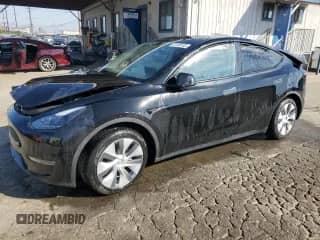 2023 Tesla Model Y Long Range z VIN 7SAYGAEE3PF903721, wystawiony jako Copart lot #87489155 z przebiegiem Nie podano mil oraz Szkoda całkowita • Salvage title. Historia ofert i sprzedaży dostępna na DreamBid. Obrazek 1.