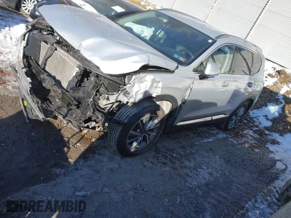 2019 Hyundai Santa Fe SEL with VIN 5NMS3CAD0KH089882, listed as a IAAI auction lot 41613964 with 38,371 mi miles and . Bid and sale history available at DreamBid. Image 2.