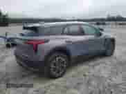 2024 Chevrolet Blazer EV eAWD LT z VIN 3GNKDBRJXRS267793, wystawiony jako Copart lot #58015815 z przebiegiem 3 125 mil mil oraz Szkoda całkowita • Salvage title. Historia ofert i sprzedaży dostępna na DreamBid. Obrazek 3.