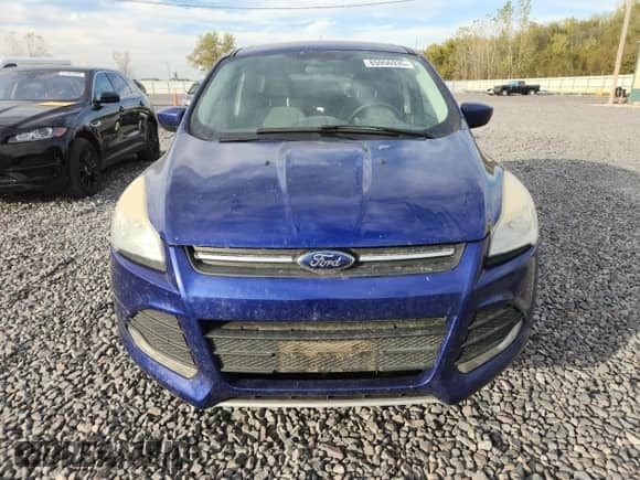 2014 Ford Escape SE z VIN 1FMCU0G97EUD17078, wystawiony jako Copart lot #85956935 z przebiegiem 189 669 mil mil oraz Czysty tytuł • Clean title. Historia ofert i sprzedaży dostępna na DreamBid. Obrazek 5.