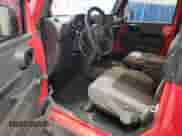 2009 Jeep Wrangler X с VIN 1J4FA24109L733404, выставлен на аукционе Copart как лот 82075825 с пробегом 149 544 миль миль и Списание • Salvage title. История ставок и продаж доступна на DreamBid. Изображение 8.