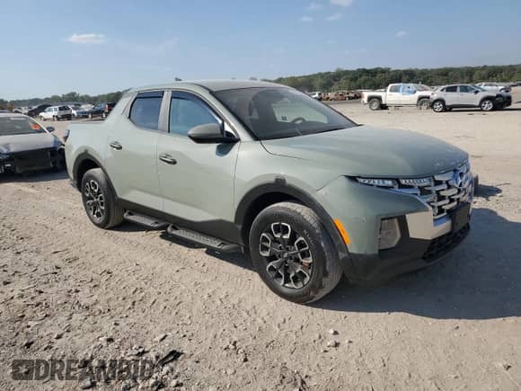 2024 Hyundai Santa Cruz SEL with VIN 5NTJBDDE6RH111147, listed as a Copart auction lot 85324075 with 6,500 mi miles and Salvage title. Bid and sale history available at DreamBid. Image 4.
