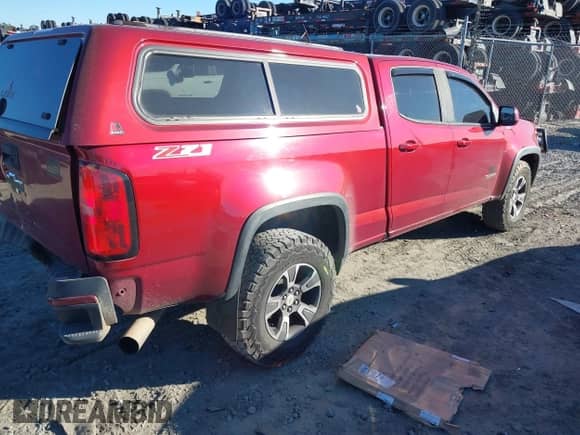 2018 Chevrolet Colorado 4WD Z71 with VIN 1GCPTDE11J1177019, listed as a IAAI auction lot 41047647 with 130,492 mi miles and . Bid and sale history available at DreamBid. Image 4.