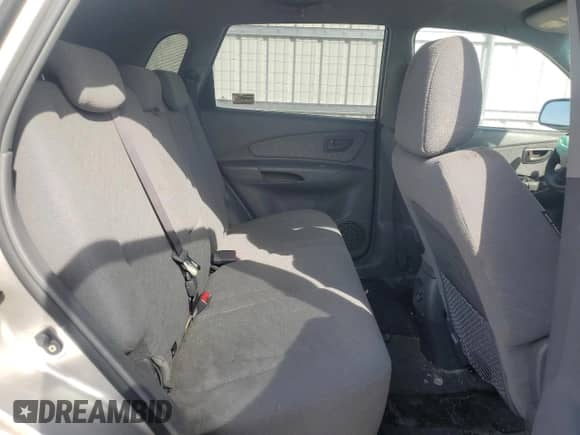 2005 Hyundai Tucson GL z VIN KM8JM12B05U069649, wystawiony jako Copart lot #66017225 z przebiegiem 104 931 mil mil oraz Szkoda całkowita • Salvage title. Historia ofert i sprzedaży dostępna na DreamBid. Obrazek 11.