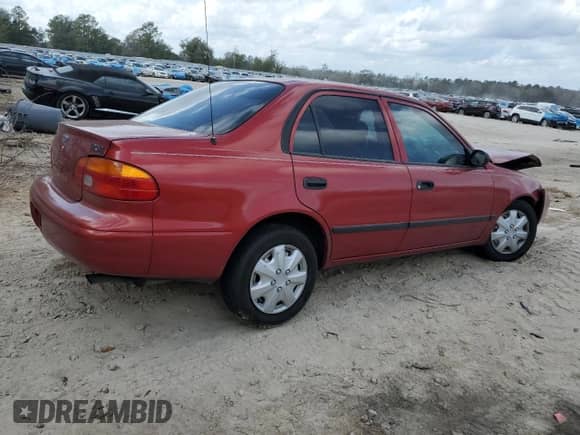 2001 Chevrolet Prizm с VIN 1Y1SK52811Z428154, выставлен на аукционе Copart как лот 44947305 с пробегом Не указан миль и Списание • Salvage title. История ставок и продаж доступна на DreamBid. Изображение 3.