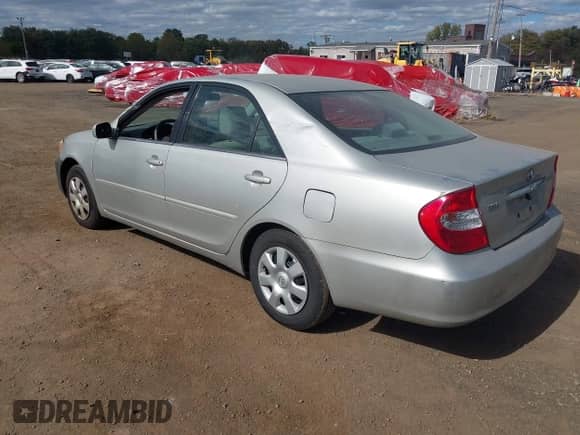 2003 Toyota Camry XLE z VIN 4T1BE32K33U738894, wystawiony jako IAAI lot #43410887 z przebiegiem 235 933 mil mil oraz . Historia ofert i sprzedaży dostępna na DreamBid. Obrazek 3.