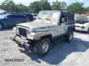 2005 Jeep Wrangler X z VIN 1J4FA39SX5P370491, wystawiony jako IAAI lot #43156077 z przebiegiem 110 362 mil mil oraz . Historia ofert i sprzedaży dostępna na DreamBid. Obrazek 2.