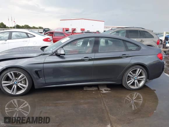 2017 BMW 4 Series 440i with VIN WBA4E3C59HG187184, listed as a IAAI auction lot 42990913 with 79,418 mi miles and . Bid and sale history available at DreamBid. Image 14.