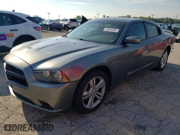 2011 Dodge Charger RT with VIN 2B3CM5CT2BH610941, listed as a Copart auction lot 63684095 with 153,143 mi miles and Clean title. Bid and sale history available at DreamBid. Image 1.