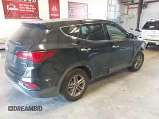 2018 Hyundai Santa Fe 2.4L с VIN 5XYZT3LB8JG551754, выставлен на аукционе IAAI как лот 43127187 с пробегом 139 734 миль миль и . История ставок и продаж доступна на DreamBid. Изображение 4.